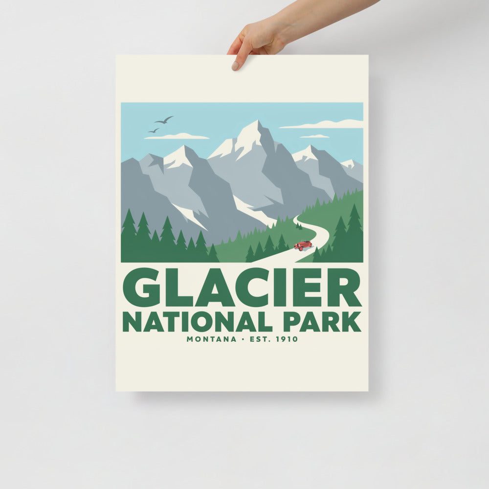 Glacier National Park vintage travel poster held at one corner against a plain wall