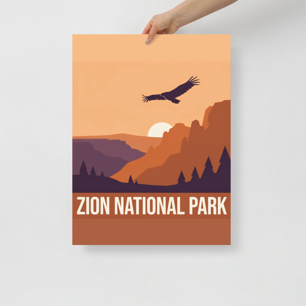 Zion National Park vintage travel poster held at one corner against a plain wall