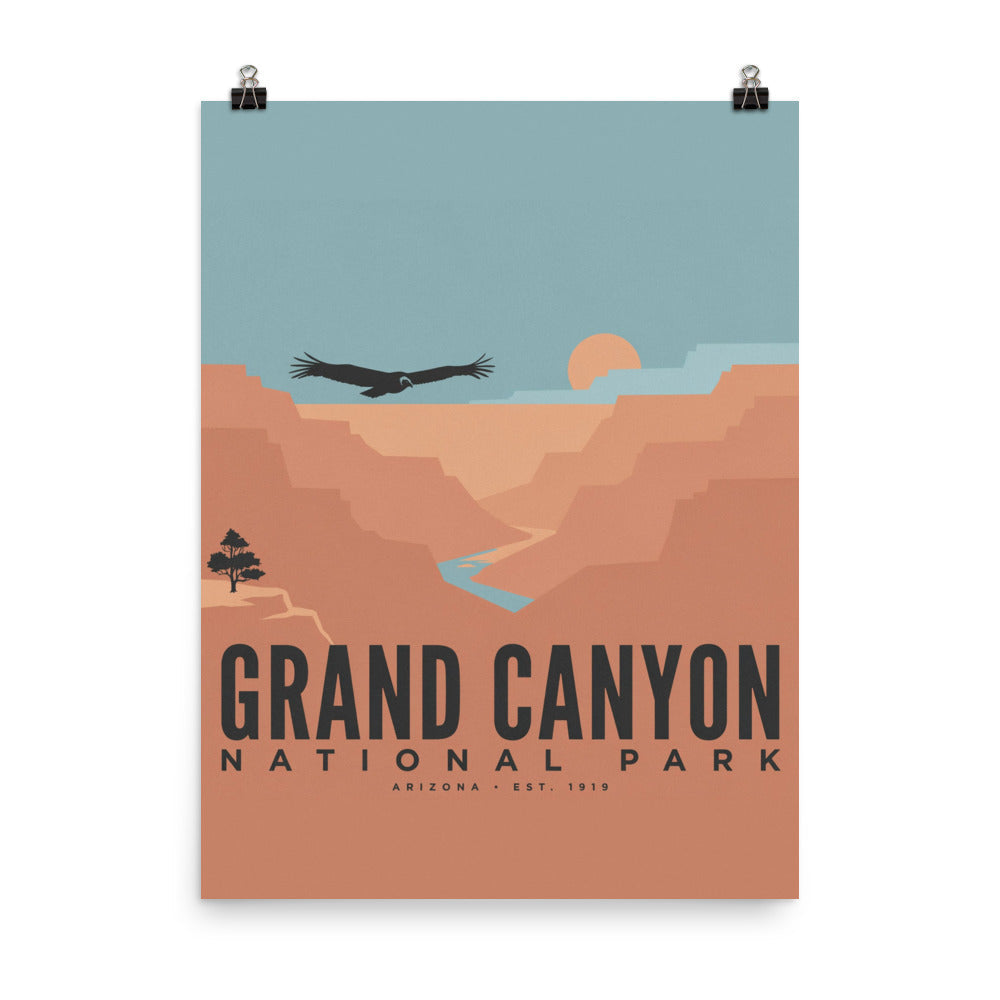 Grand Canyon National Park vintage travel poster hung from clips against a white wall