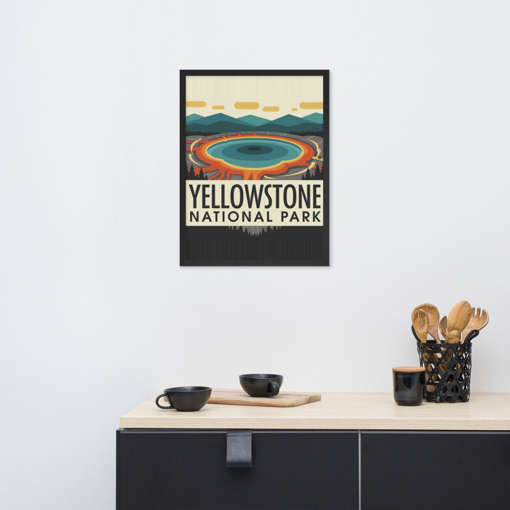Framed Yellowstone National Park vintage travel poster showing Grand Prismatic Spring in a black wood frame, hanging on a wall above a kitchen counter