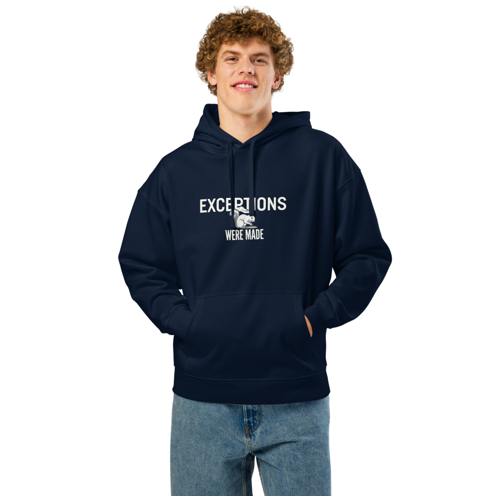 Man wearing the French Navy squirrel hoodie with EXCEPTIONS WERE MADE around a squirrel eating seed