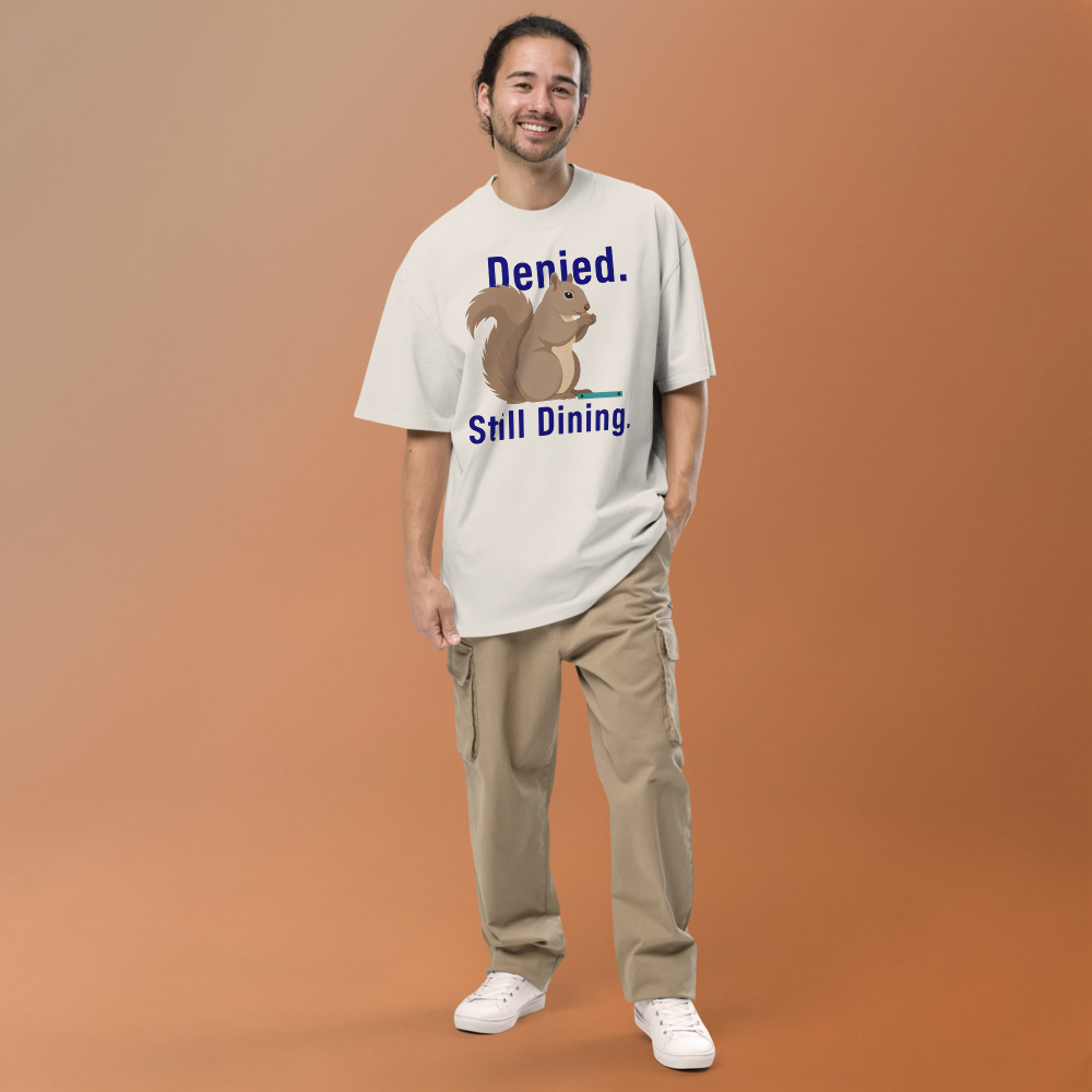 Man in the faded bone squirrel shirt against a warm backdrop