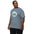 Mount Rainier National Park badge tee worn by a model in Blue Jean, side angle
