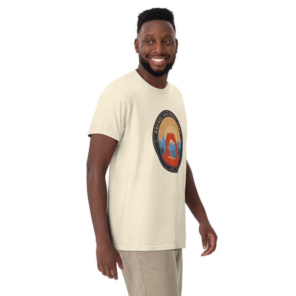 Arches National Park badge tee worn by a model in Ivory