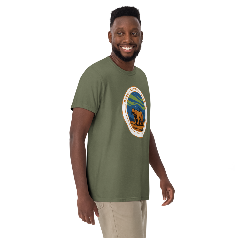 Denali National Park vintage badge t-shirt in Moss worn by a model, front view
