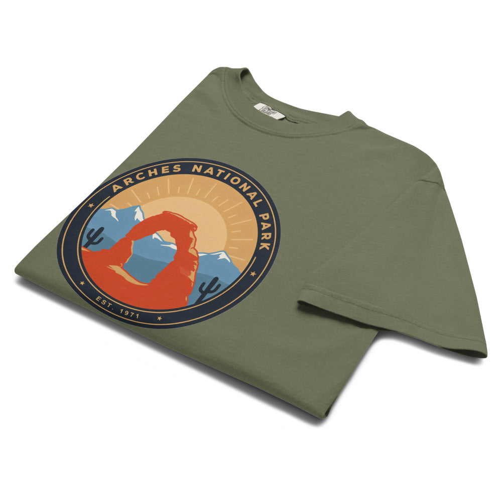 Arches National Park badge tee in Moss, folded view