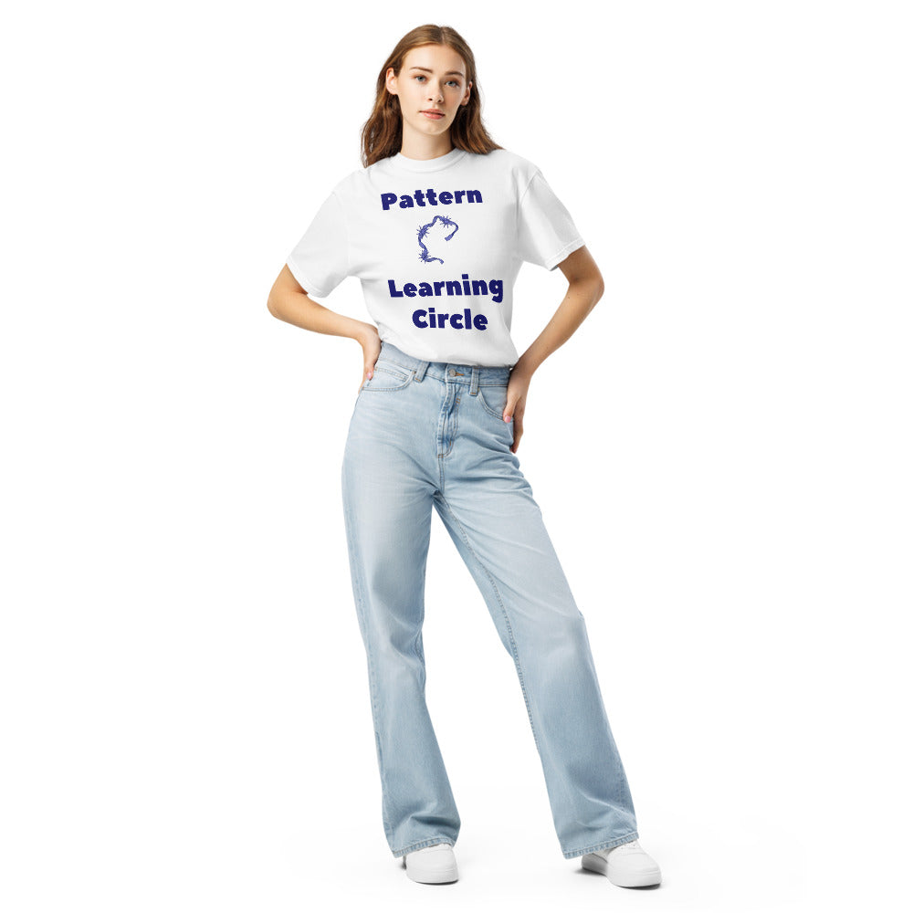 Full-length front view of a woman in the White Pattern Learning Circle constellation shirt with jeans