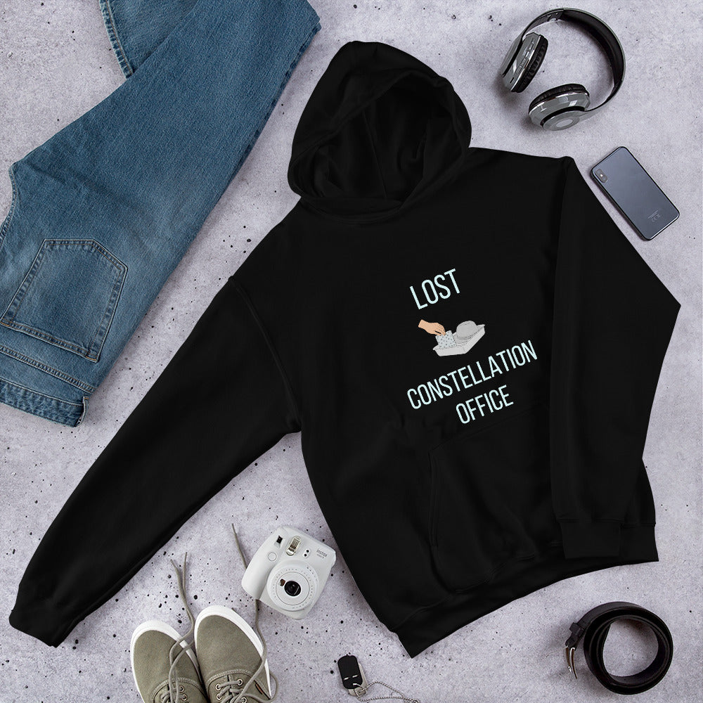 Black Lost Constellation Office constellation hoodie laid flat with jeans, headphones and a camera