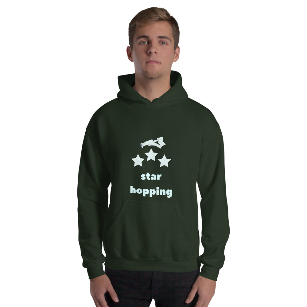 Man wearing the forest green Star Hopping hoodie with the telescope and three stars print, front view