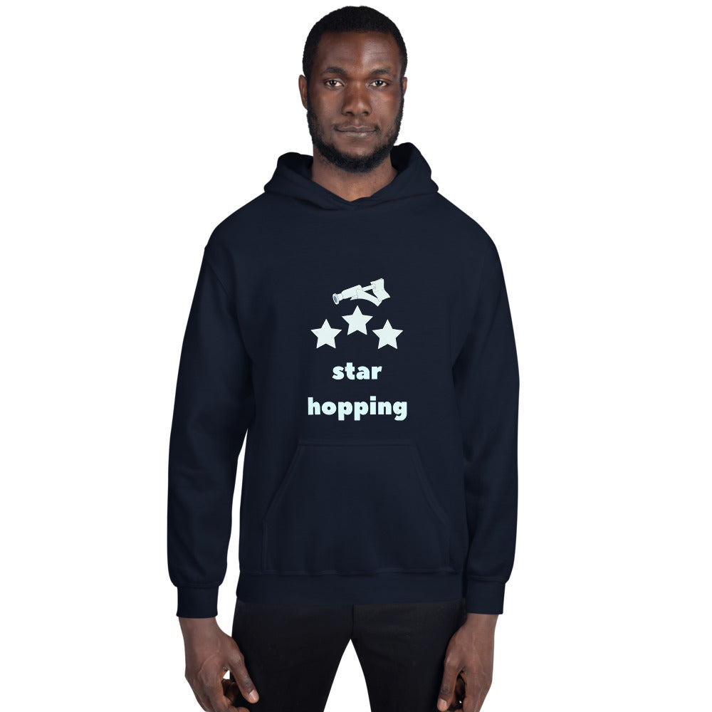 Man wearing the navy Star Hopping hoodie, telescope and three stars design facing the camera