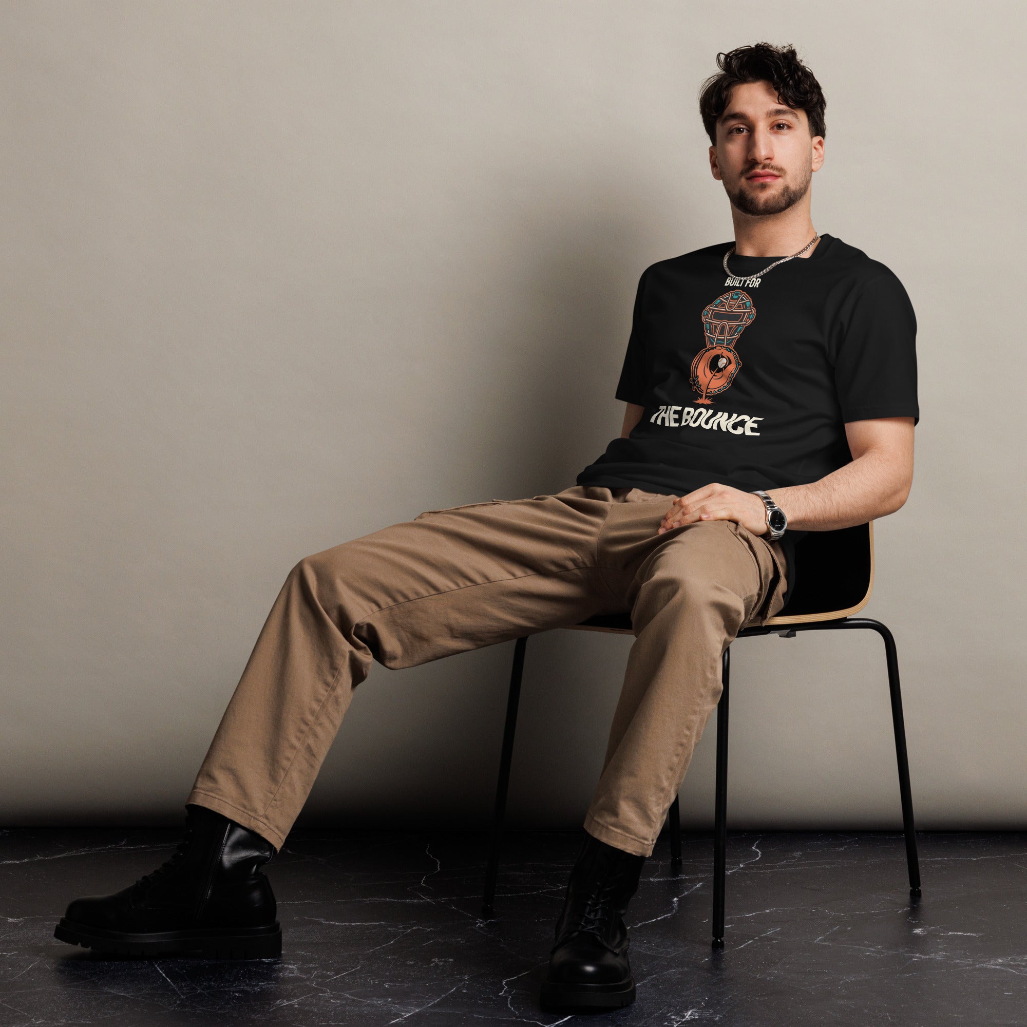 Front view of a man wearing the Baseball Catcher Shirt – Built for the Bounce cotton T-shirt in black.