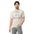 Front view of a man wearing the Scorekeeper Shirt – Inning Archivist cotton T-shirt in bone.