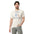 Front view of a man wearing the Scorekeeper Shirt – Inning Archivist cotton T-shirt in ecru.