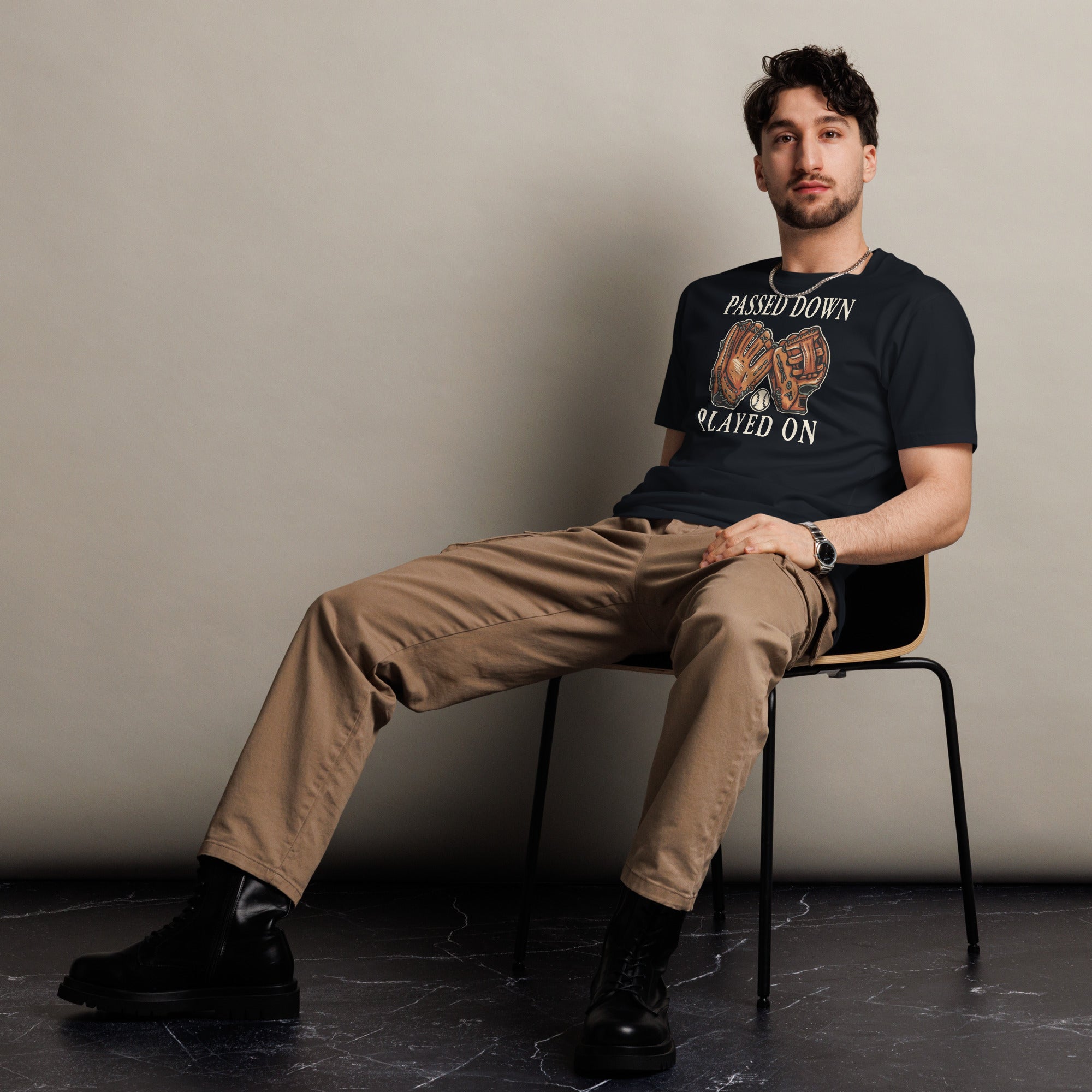 Front view of a man wearing the Baseball Dad Shirt – Passed Down, Played On cotton T-shirt in navy.