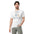 Front view of a man wearing the Scorekeeper Shirt – Inning Archivist cotton T-shirt in white.