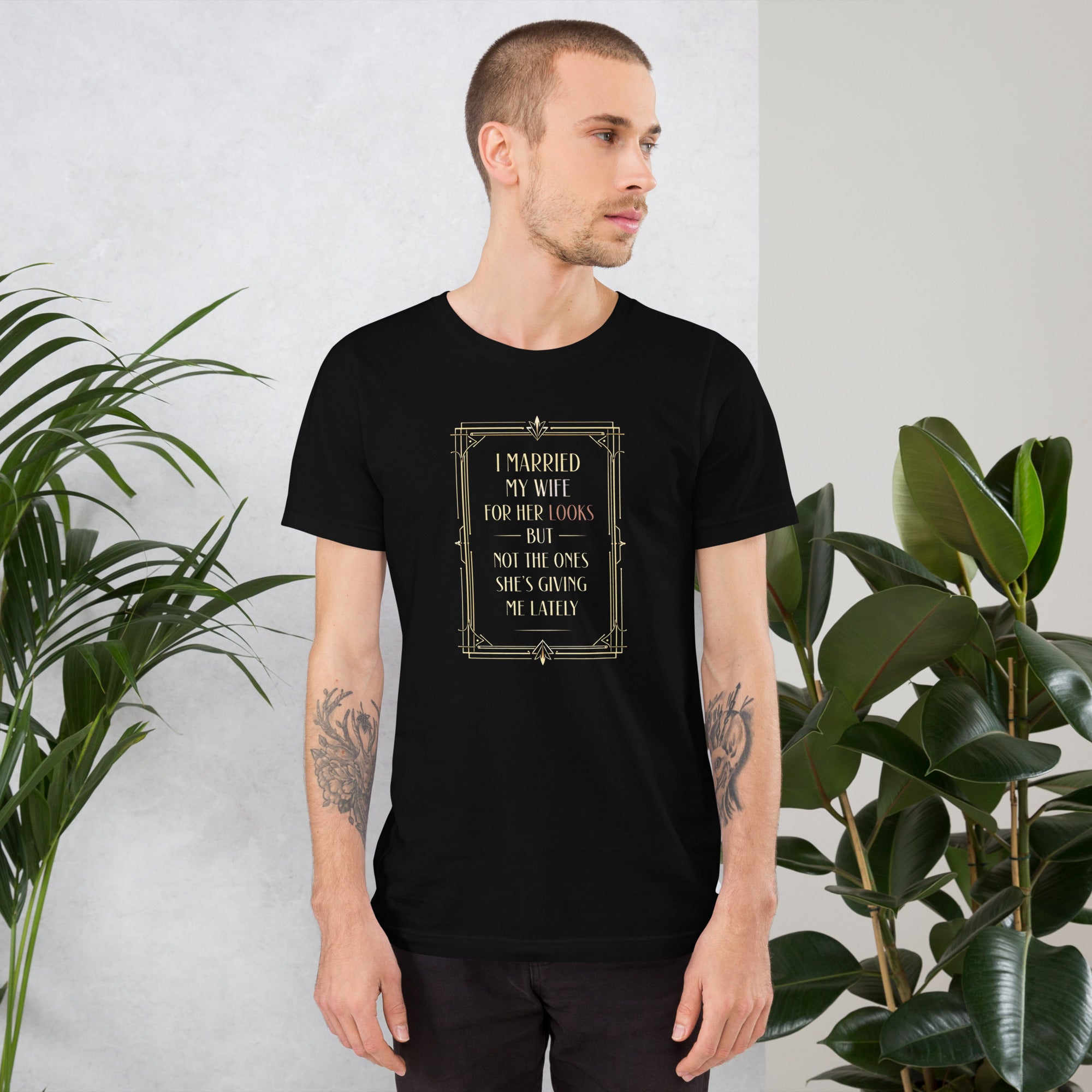 Funny husband shirt in Black, front view mockup of the I Married My Wife for Her Looks tee