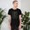 Funny husband shirt in Black, front view mockup of the I Married My Wife for Her Looks tee