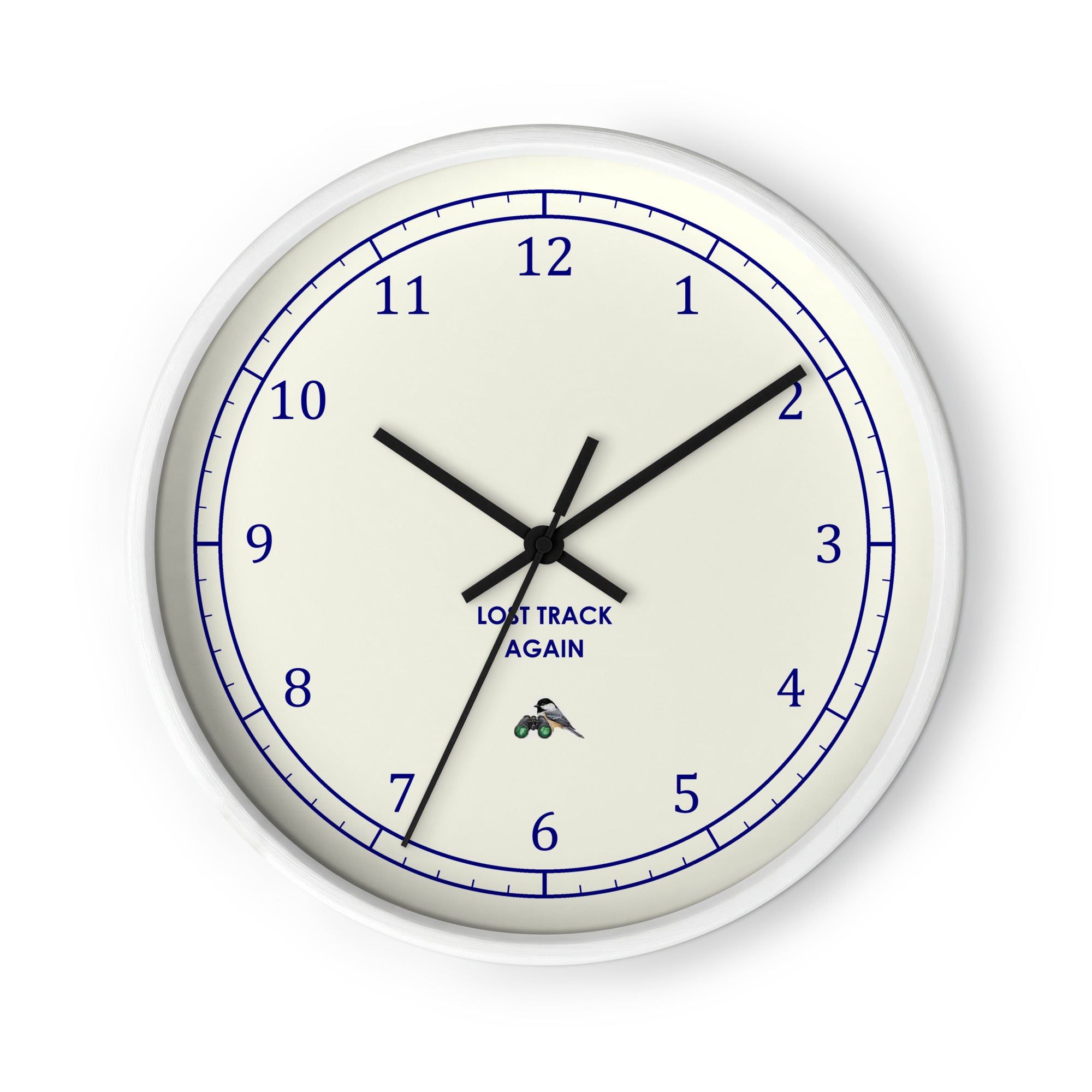 Bird clock with a white frame: classic ivory dial with navy rings and numerals, LOST TRACK AGAIN and a chickadee on binoculars
