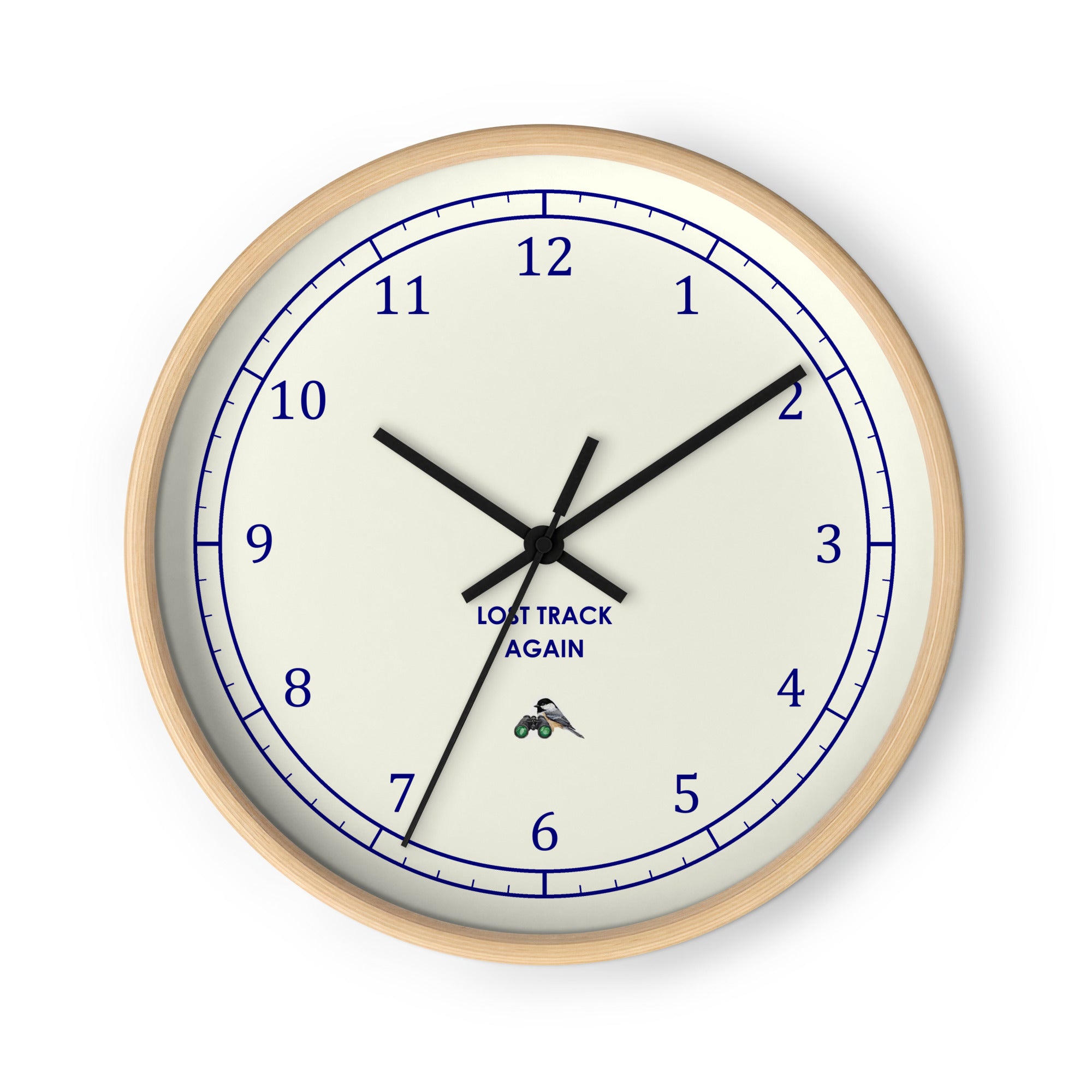 Bird clock with a natural wood frame: ivory face, twelve navy numerals, LOST TRACK AGAIN and a chickadee on binoculars, black hands