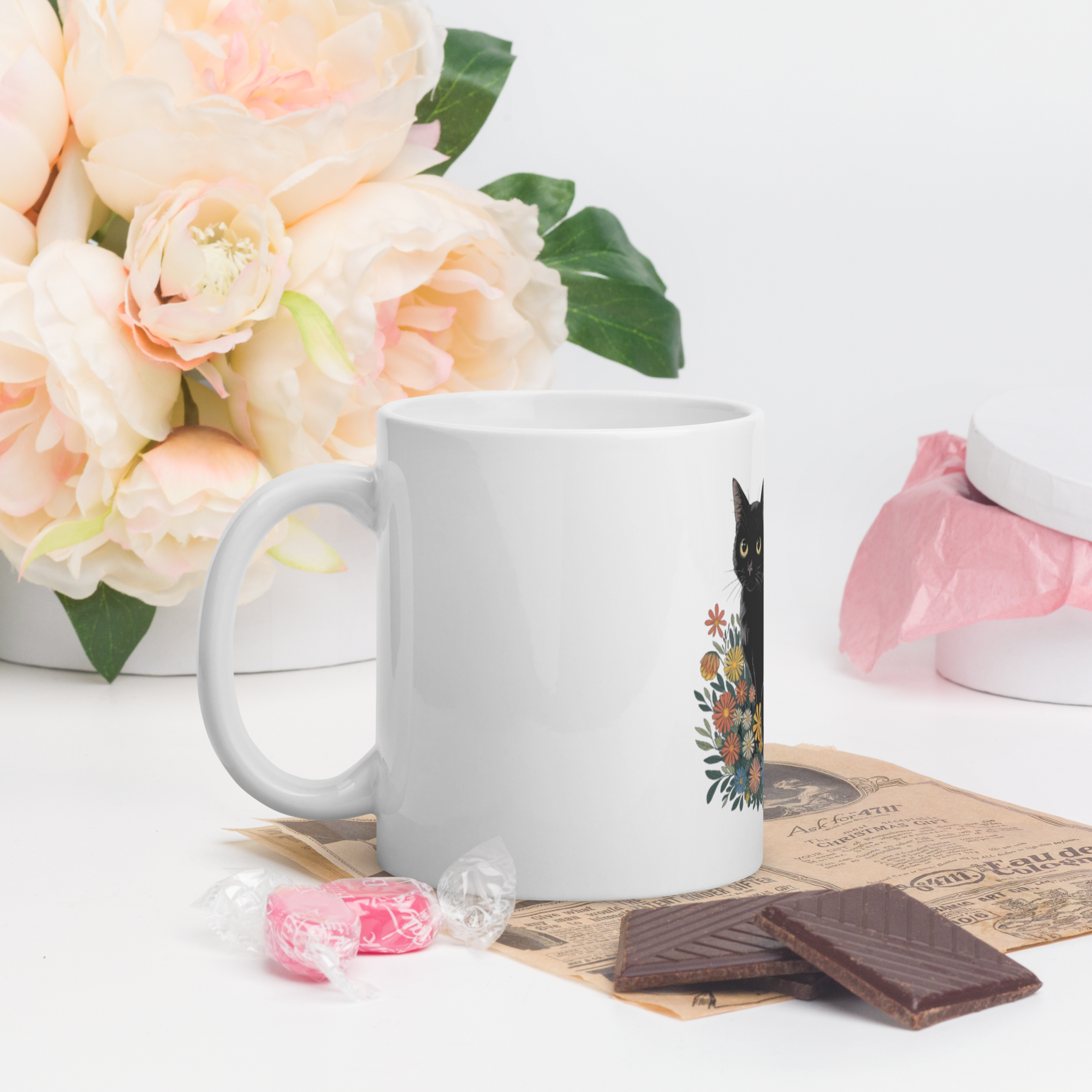 Black Cat Coffee Mug – Cute Floral Design for Cat Lovers.