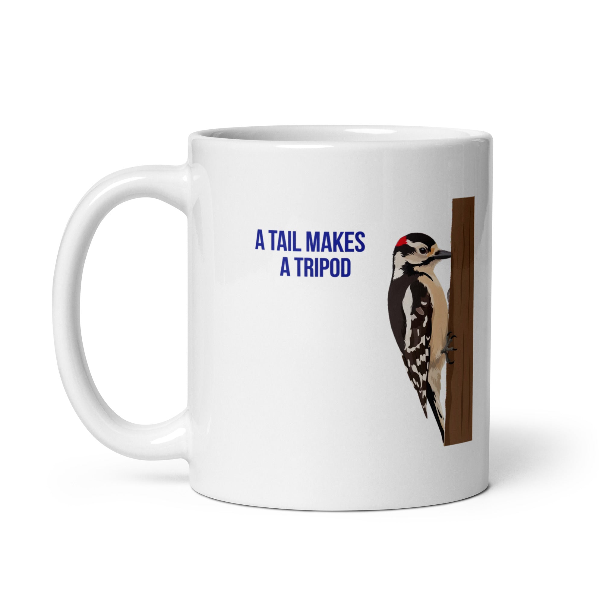11 oz woodpecker mug, handle on the left, showing the same A Tail Makes a Tripod design printed on the other side