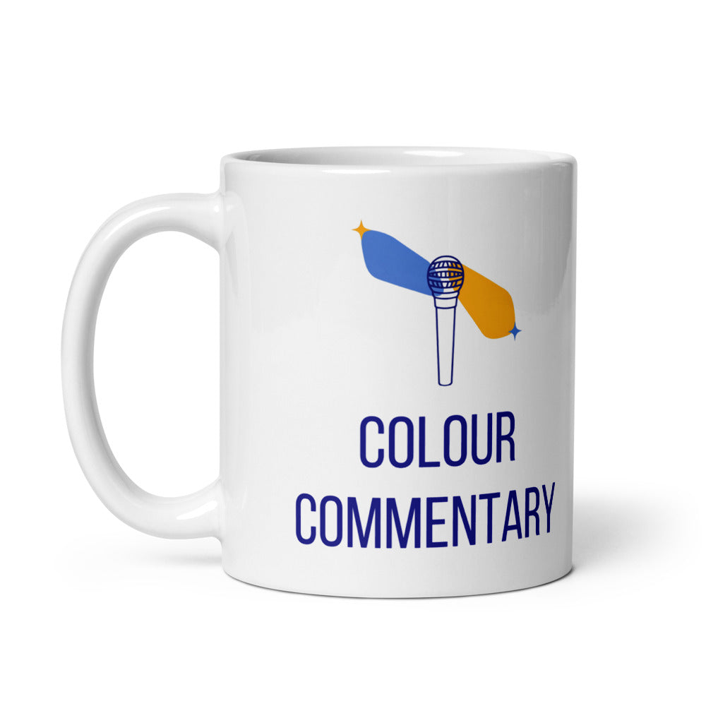 11 oz double star mug, handle on the left, showing the same Colour Commentary microphone design printed on the other side