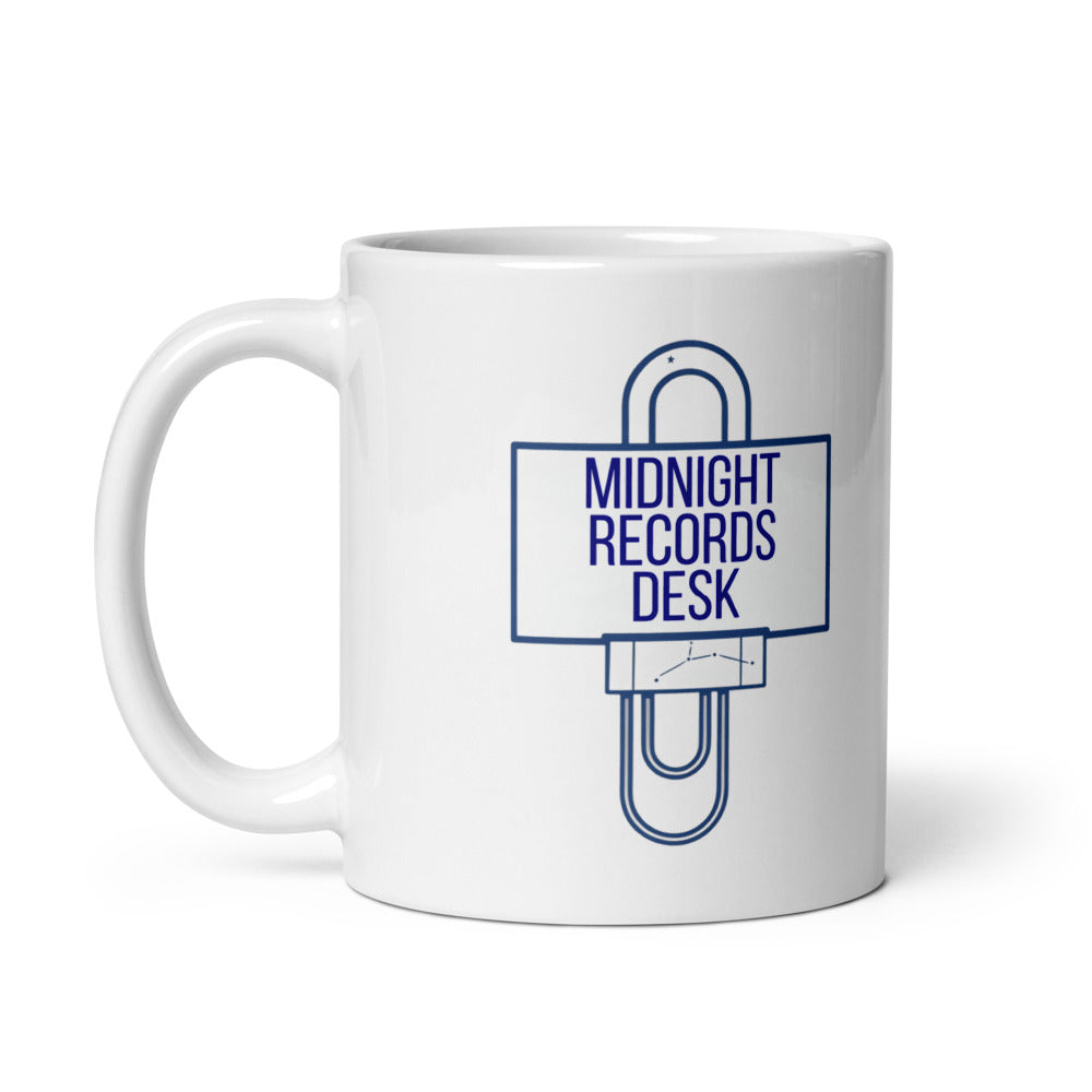 11 oz astronomy log mug, handle on the left, showing the same Midnight Records Desk design printed on the other side