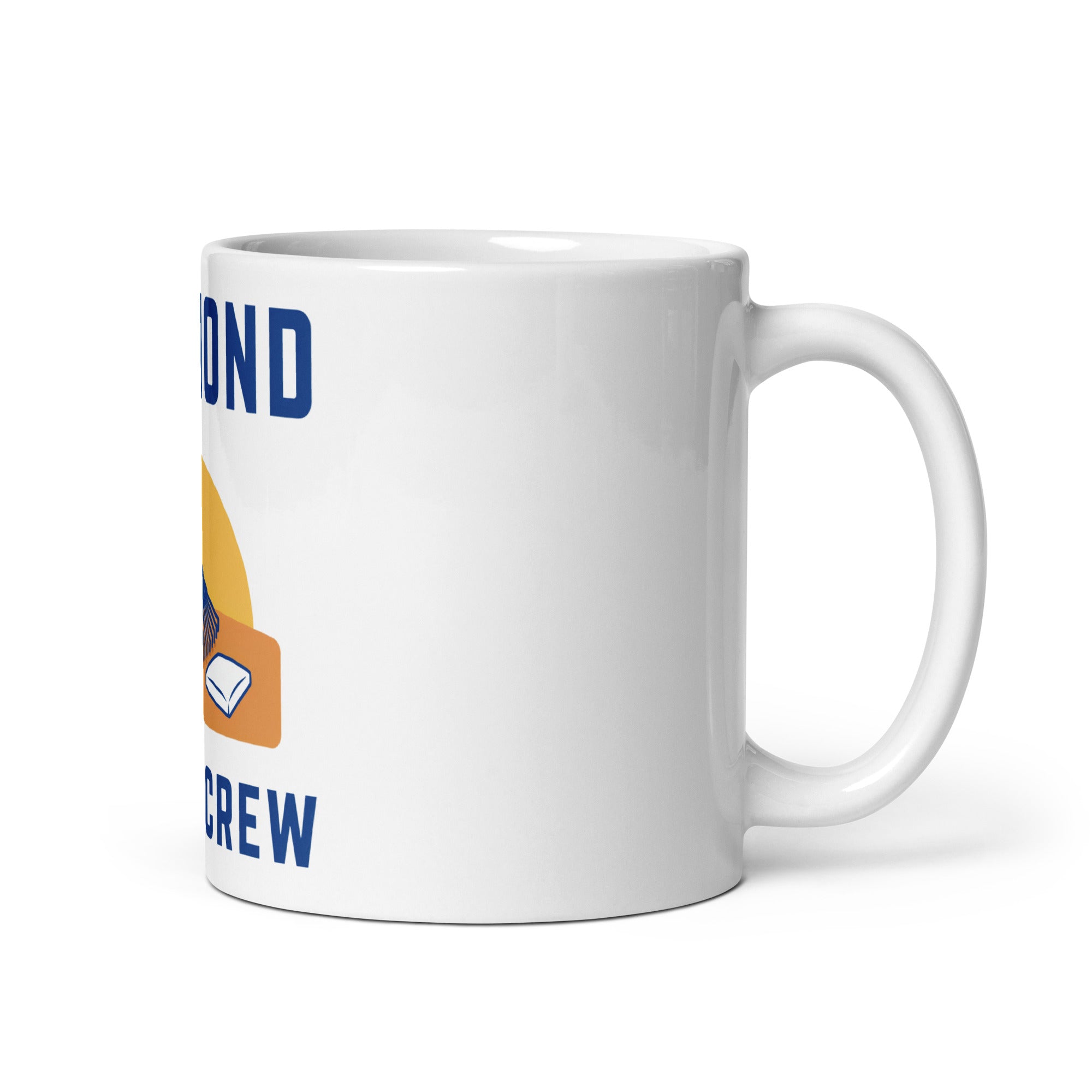 White 11 oz mug, handle on right, showing mostly white ceramic and a partial edge of the Diamond Dawn Crew artwork.