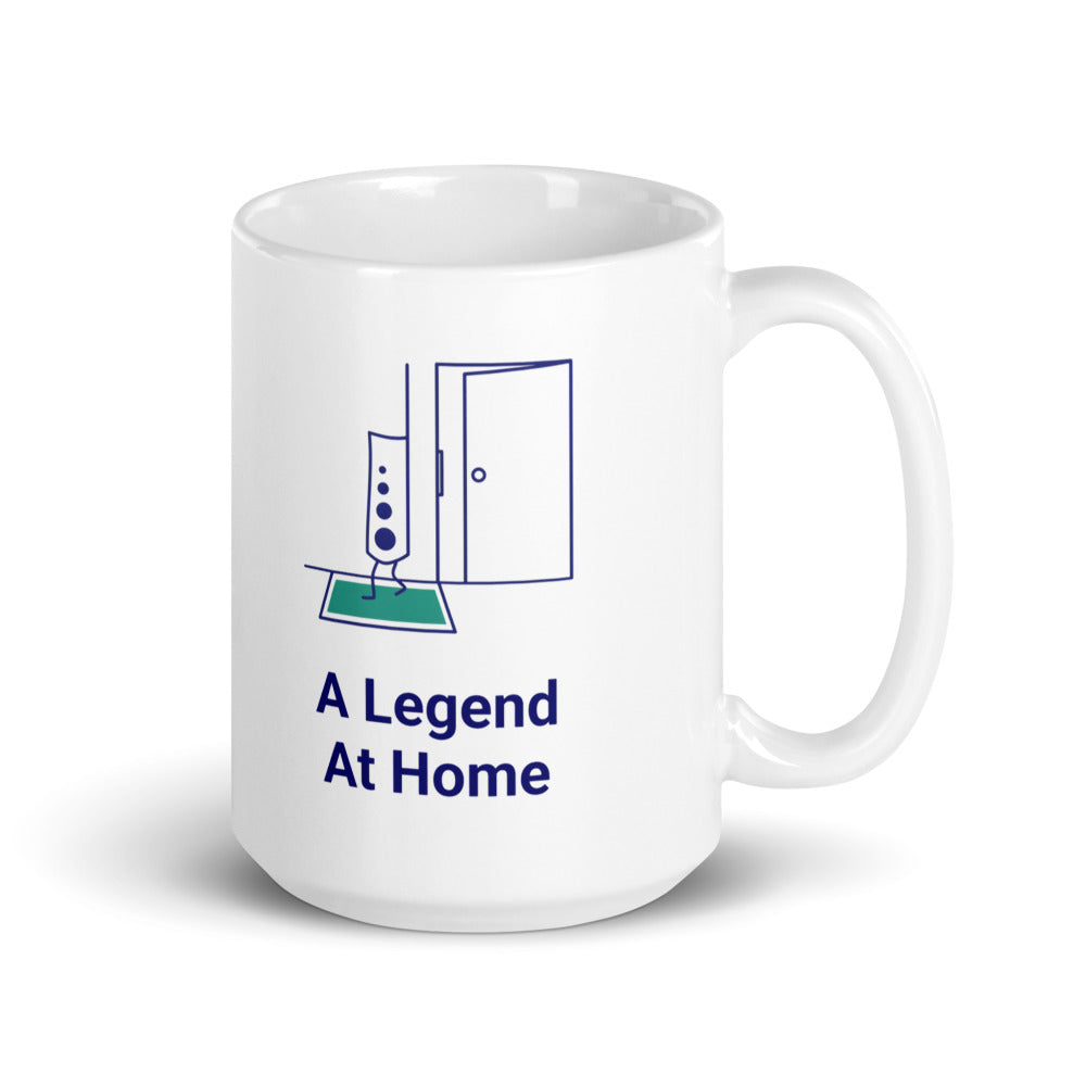 15 oz star atlas mug, handle on the right, the taller size with the doorway scene and A Legend at Home lettering